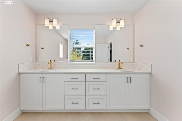 7510 NW Lauren Ave, Portland, OR 97229 - bathroom with double vanity and backsplash
