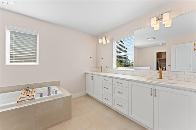7510 NW Lauren Ave, Portland, OR 97229 - full bath with double vanity, decorative backsplash, a bath, and tile patterned flooring