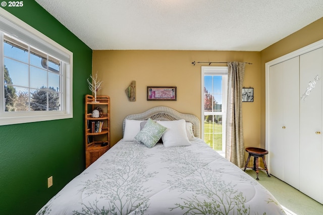4212 NE 179th St, Vancouver, WA 98686 - bedroom featuring carpet flooring, a closet, and a textured ceiling