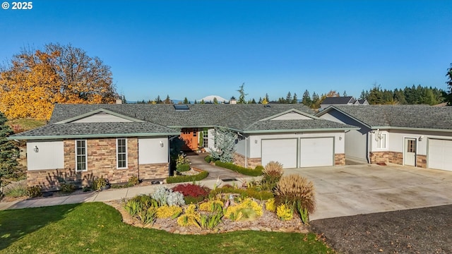 4212 NE 179th St, Vancouver, WA 98686 - ranch-style house with stone siding, a garage, driveway, and a chimney