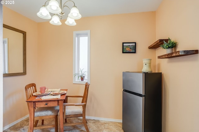 4212 NE 179th St, Vancouver, WA 98686 - dining space with a chandelier and baseboards