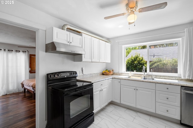 kitchen featuring black / electric stove, under cabinet range hood, stainless steel dishwasher, a sink, and white cabinets