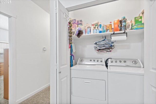 laundry room featuring carpet and washing machine and clothes dryer