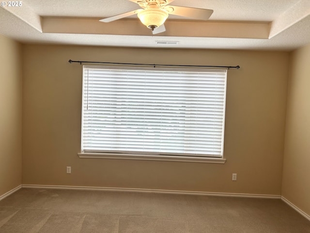 15779 SW Harvester Ln, Sherwood, OR 97140 - carpeted empty room with a ceiling fan, baseboards, and plenty of natural light
