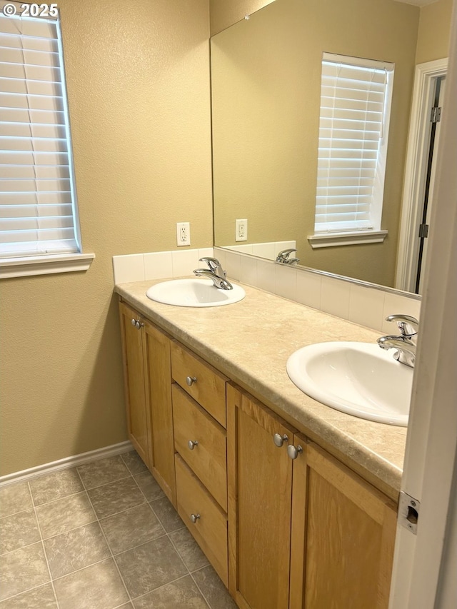 15779 SW Harvester Ln, Sherwood, OR 97140 - bathroom featuring double vanity and baseboards