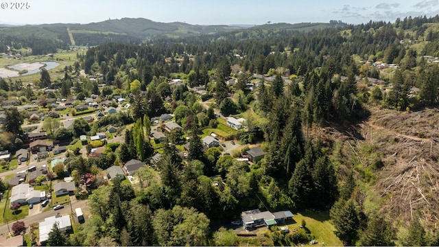 1390 Washington Ave, Coos Bay, OR 97420 - birds eye view of property featuring a residential view, a mountain view, and a wooded view