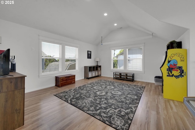 1027 Turtledove Loop, Lebanon, OR 97355 - living area with vaulted ceiling, light wood-type flooring, and recessed lighting