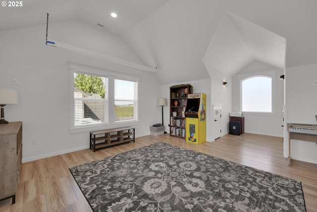 1027 Turtledove Loop, Lebanon, OR 97355 - living area with lofted ceiling and wood finished floors