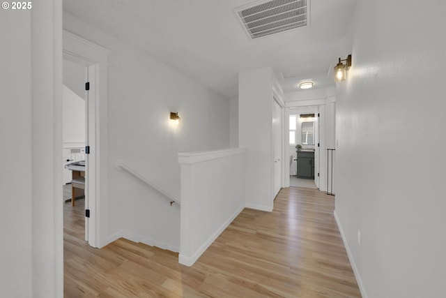 1027 Turtledove Loop, Lebanon, OR 97355 - corridor featuring an upstairs landing and light wood-style floors