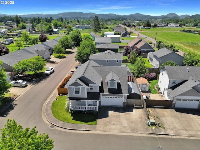 1027 Turtledove Loop, Lebanon, OR 97355 - aerial view of residential area featuring mountains