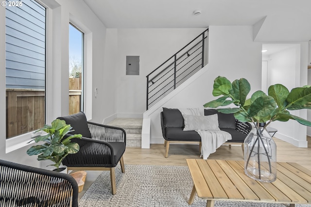 interior space with hardwood / wood-style floors and electric panel