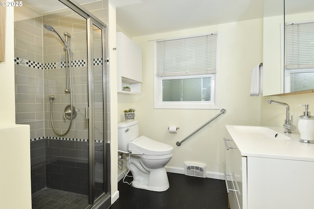 3334 NE 16th Ave, Portland, OR 97212 - bathroom with toilet, vanity, a stall shower, and baseboards
