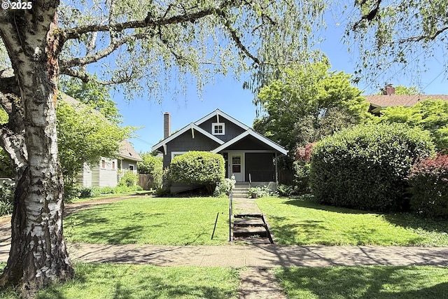 3334 NE 16th Ave, Portland, OR 97212 - view of front of house with a chimney and a front yard