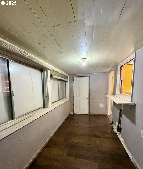 318 SW Brent Dr, John Day, OR 97845 - hallway with dark wood-style floors and baseboards