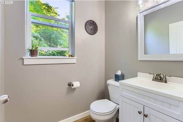 9288 SW Diamond View Way, Beaverton, OR 97007 - half bathroom with vanity, toilet, and baseboards