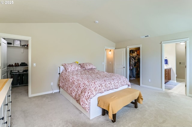 9288 SW Diamond View Way, Beaverton, OR 97007 - bedroom with a spacious closet, a closet, lofted ceiling, light carpet, and connected bathroom
