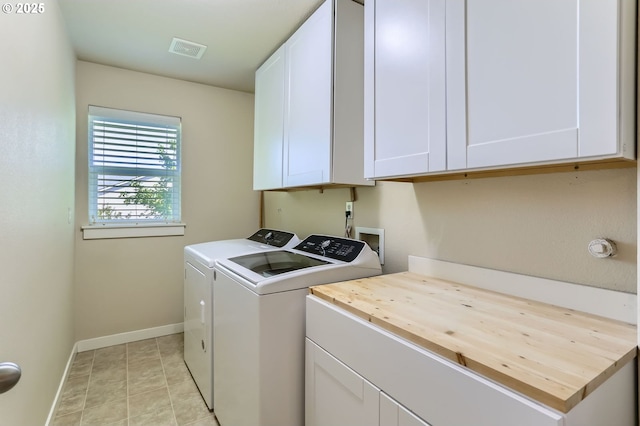 9288 SW Diamond View Way, Beaverton, OR 97007 - laundry room featuring washer and clothes dryer, cabinet space, and baseboards