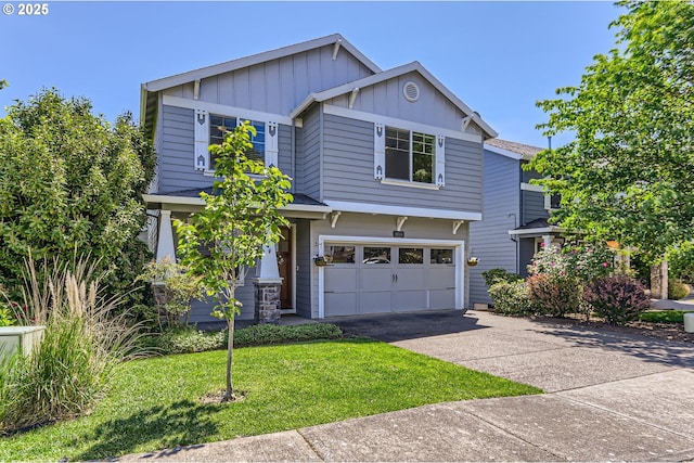 9288 SW Diamond View Way, Beaverton, OR 97007 - view of front of house featuring board and batten siding, driveway, an attached garage, and a front yard