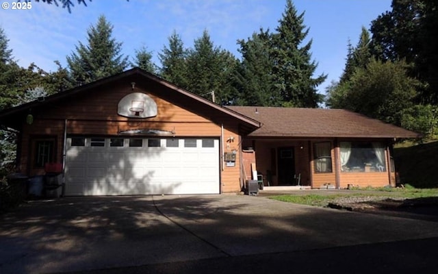 818 NW 359th St, La Center, WA 98629 - ranch-style house featuring driveway and a garage