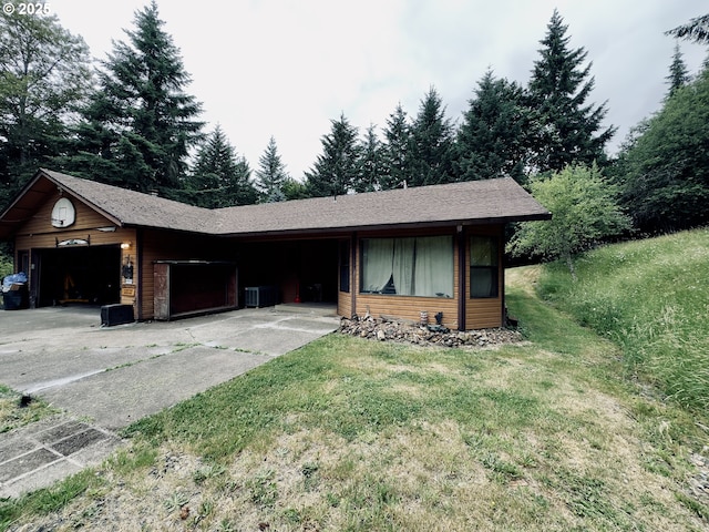 818 NW 359th St, La Center, WA 98629 - ranch-style home with a garage, a front lawn, and driveway