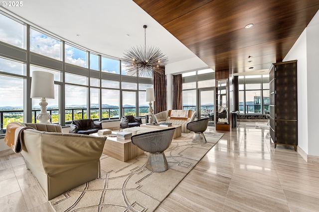 3601 S River Pkwy Unit 3101, Portland, OR 97239 - community lobby featuring a high ceiling, expansive windows, and wood ceiling