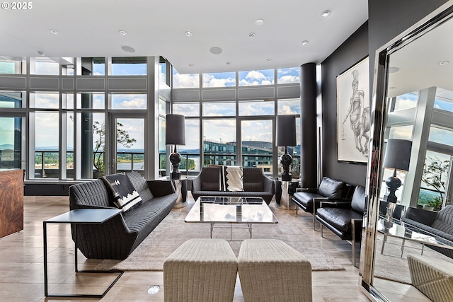 3601 S River Pkwy Unit 3101, Portland, OR 97239 - building lobby with a wall of windows and a towering ceiling