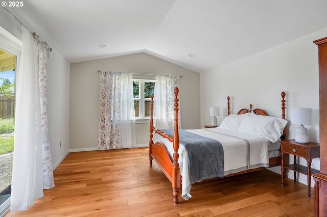 2110 NW Kings Blvd, Corvallis, OR 97330 - bedroom featuring lofted ceiling, light wood finished floors, and baseboards