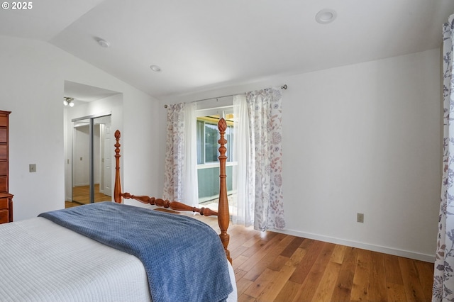 2110 NW Kings Blvd, Corvallis, OR 97330 - bedroom with light wood finished floors, vaulted ceiling, baseboards, and a closet