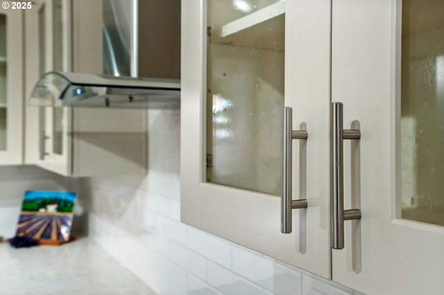2110 NW Kings Blvd, Corvallis, OR 97330 - kitchen view of wall chimney exhaust hood and white cabinetry