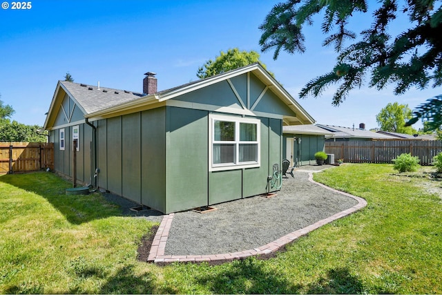 2110 NW Kings Blvd, Corvallis, OR 97330 - rear view of property with a chimney, a patio, and roof with shingles