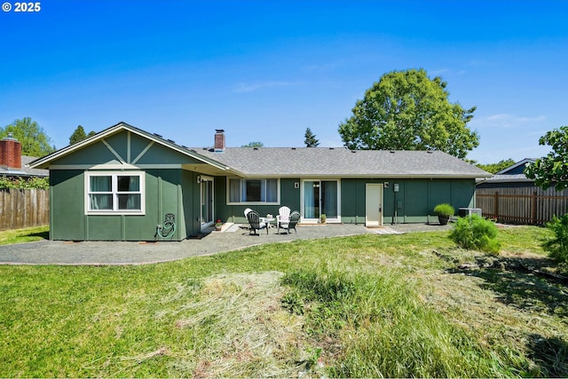 2110 NW Kings Blvd, Corvallis, OR 97330 - back of house with a patio area, a chimney, and central air condition unit