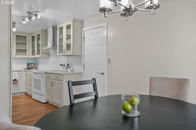 2110 NW Kings Blvd, Corvallis, OR 97330 - dining space featuring a chandelier and light wood finished floors