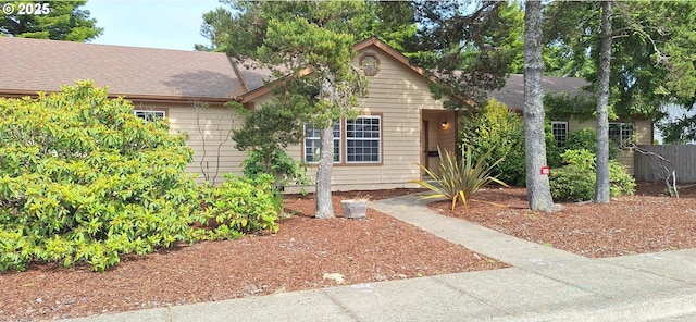 3890 Spruce St, Florence, OR 97439 - view of front of property with a shingled roof