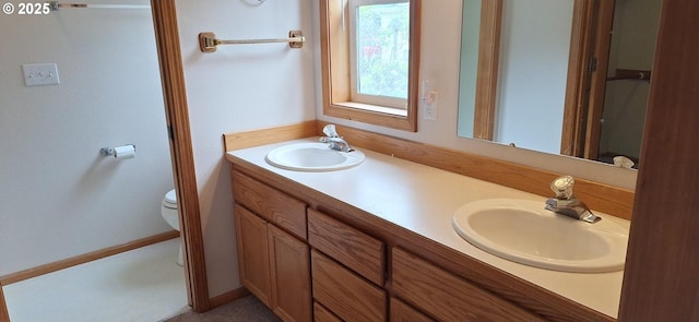 3890 Spruce St, Florence, OR 97439 - bathroom with double vanity and toilet