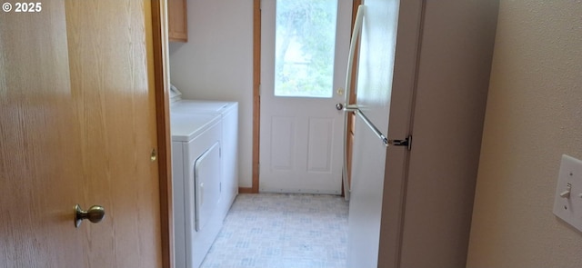3890 Spruce St, Florence, OR 97439 - laundry area with independent washer and dryer, cabinet space, and light floors