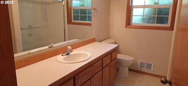 3890 Spruce St, Florence, OR 97439 - full bathroom with vanity, healthy amount of natural light, and a shower with shower door