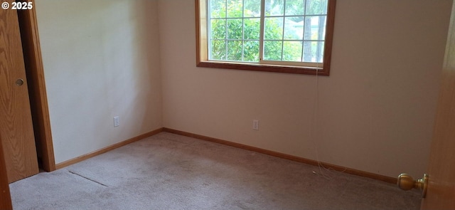 3890 Spruce St, Florence, OR 97439 - spare room featuring carpet flooring and baseboards