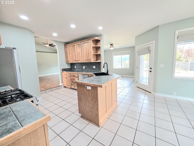 292 Jamie Loop, Roseburg, OR 97471 - kitchen featuring a ceiling fan, open shelves, freestanding refrigerator, a peninsula, and recessed lighting