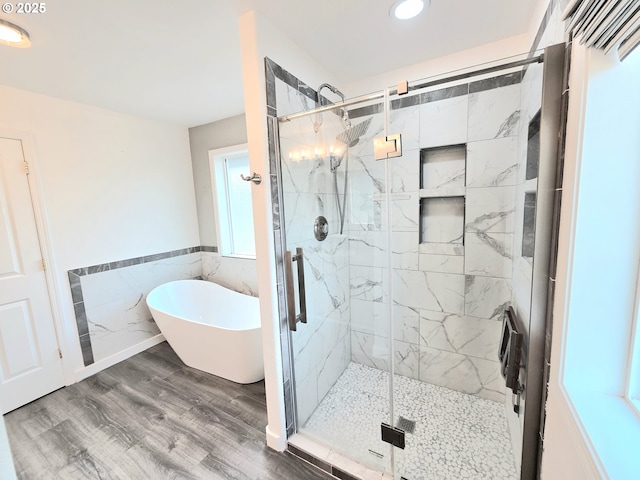 292 Jamie Loop, Roseburg, OR 97471 - full bath with a soaking tub, tile walls, wood finished floors, a marble finish shower, and recessed lighting