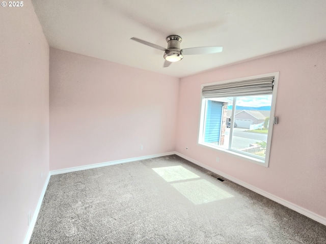 292 Jamie Loop, Roseburg, OR 97471 - spare room featuring carpet floors and a ceiling fan