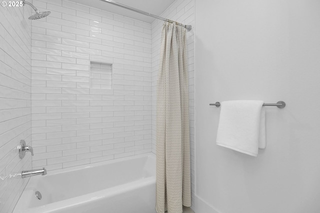 bathroom with shower / tub combo