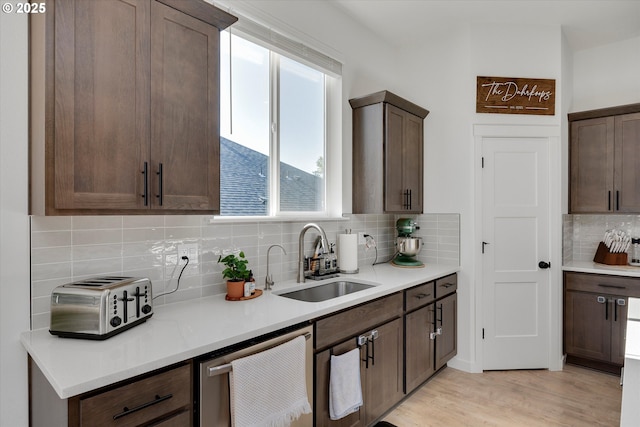 1654 NE Joy Ln, Estacada, OR 97023 - kitchen with a sink, stainless steel dishwasher, light countertops, tasteful backsplash, and healthy amount of natural light