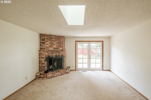 1949 Waln Creek Dr, Salem, OR 97306 - unfurnished living room with carpet flooring, a fireplace, a textured ceiling, and baseboards