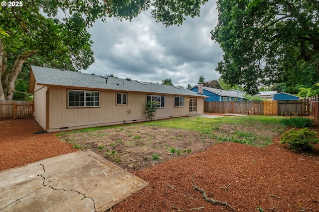 1949 Waln Creek Dr, Salem, OR 97306 - back of property featuring a patio, crawl space, and a fenced backyard