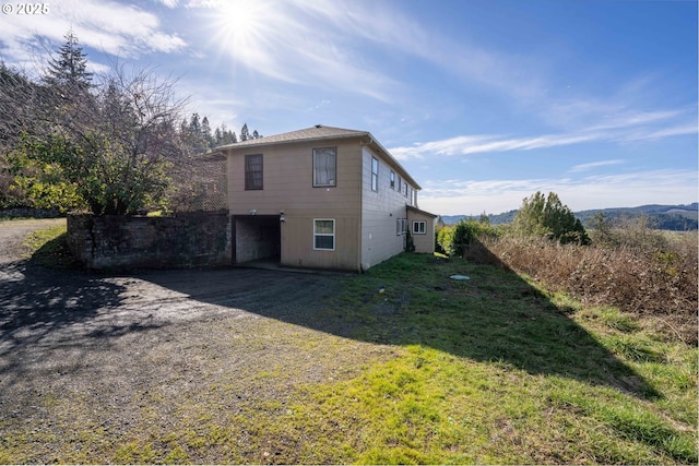 back of house with a yard