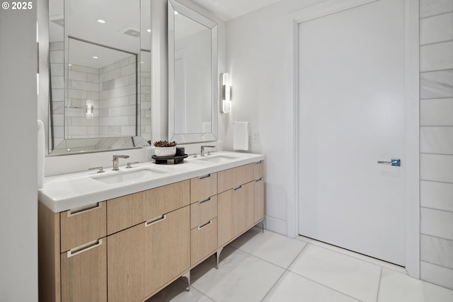 550 SW 10th Ave Unit 2306, Portland, OR 97205 - bathroom with double vanity, tile patterned floors, a sink, and a shower