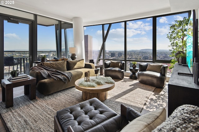 550 SW 10th Ave Unit 2306, Portland, OR 97205 - living area featuring expansive windows and wood finished floors