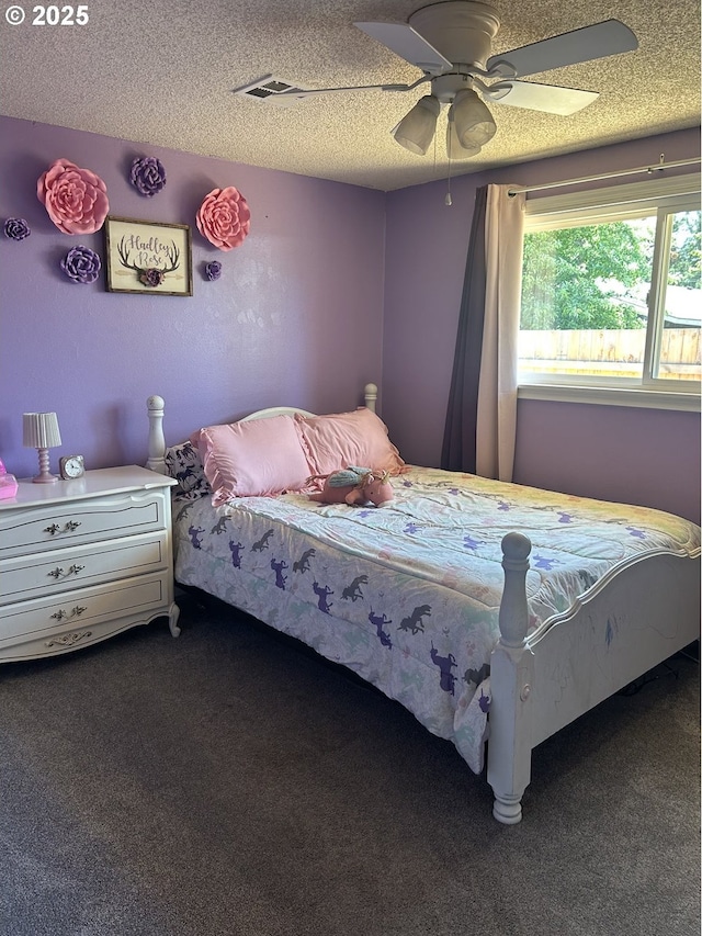 715 N 16th St, Cottage Grove, OR 97424 - carpeted bedroom with ceiling fan and a textured ceiling