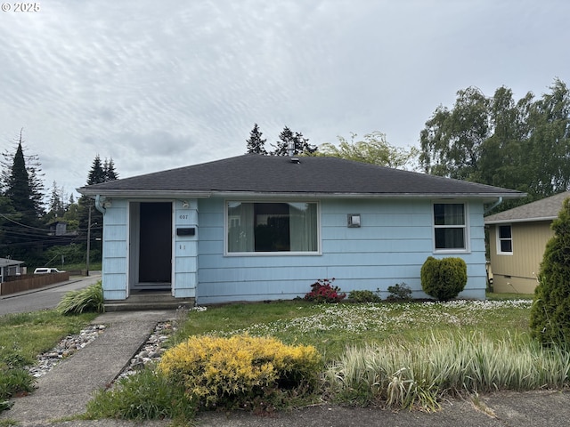 607 Commercial St, North Bend, OR 97459 - bungalow-style house with a shingled roof