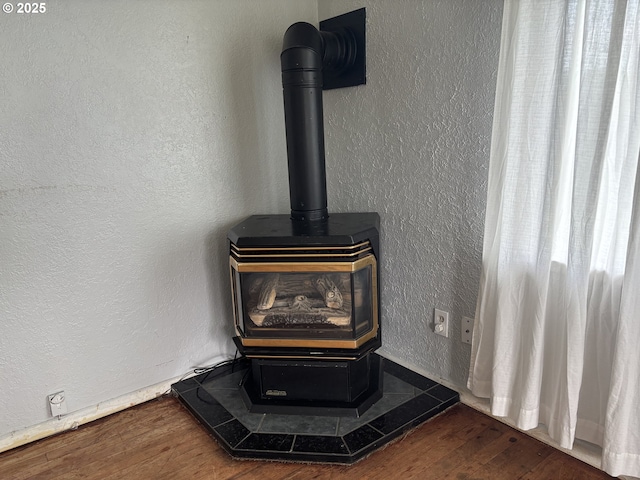 607 Commercial St, North Bend, OR 97459 - detailed view of a wood stove and wood finished floors